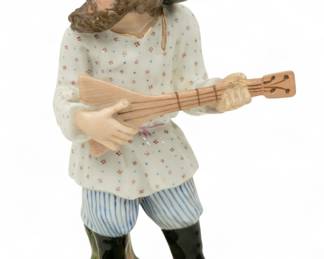 Lot 100 | Kornilov Brothers (Russian) Porcelain Figure 'Musician', H 6.75" W 2.25" L 3.75"