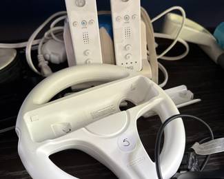 Nintendo Wii remotes & Mario Kart Racing Wheel
