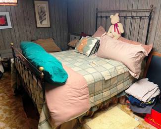 A wonderful antique iron and brass full size bed set!