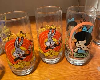 Vintage Happy birthday Bugs 50thth Anniversary drinking glasses & 1986 pizza hut the flintstone kids glass featuring Betty Rubble