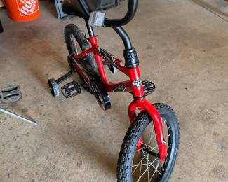 Huffy 16" "Rock it" bicycle in red with training wheels