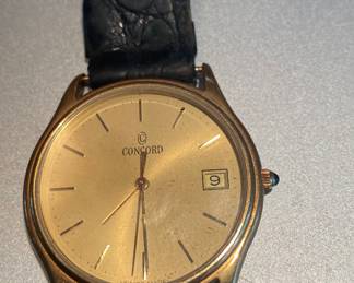 Concord 14k Gold Watch. Gold tone dial sticks and date function
