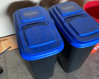 Kingsford Charcoal dispenser black with blue lid full of charcoal