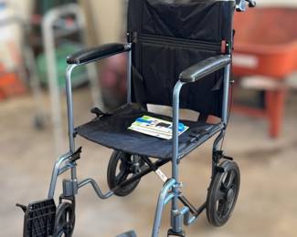 Good wheelchair - high handles for a tall helper