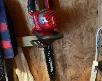 #63 Electric Chainsaw - Home-lite 14" $20.00