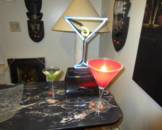 Bar with martini neon glass sign, martini light up, martini clock, martini candle.