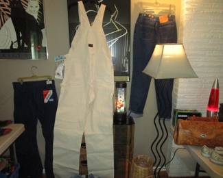 Post Moden mirrored end table, lamp, lava lamp, 1980's framed art, Vintage denim including Stan Ray new/old stock with tags coveralls, Levis with "wash em hot" tag and so much more. Piles of denim!