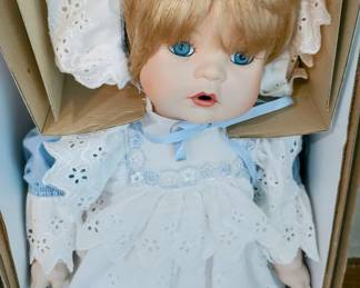Moments Treasured collectible doll