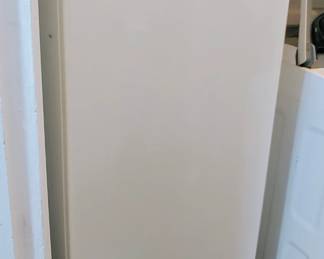 Under cabinet upright freezer