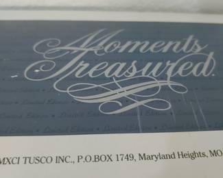 Moments Treasured collectible doll