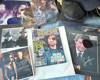 Quite a few Kurt Russell autographed items.
