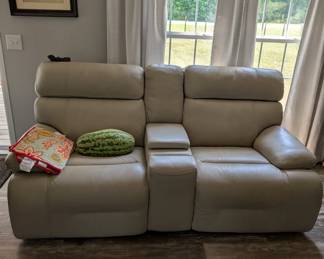Newer leather electric love seat