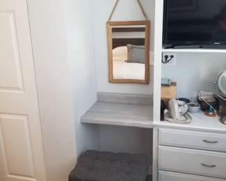 Light fixture; mirror; bench