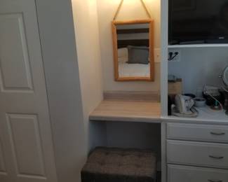 Light fixture; mirror; bench
