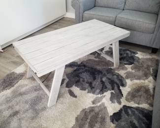 Coffee table; area rug