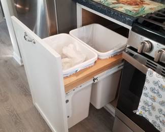 Kitchen cabinets feature: trash corral