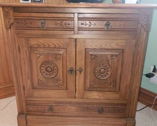 Antique spoon carved cabinet 