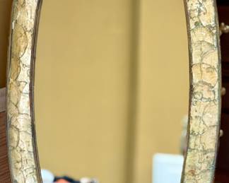 Unique Oval Mirror with Attached Stand is very Cool.