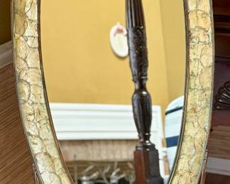 Unique Oval Mirror with Attached Stand is very Cool.