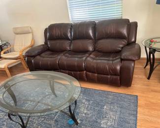 Nice leather Sofa Glass top w/metal base coffee table and two end tables