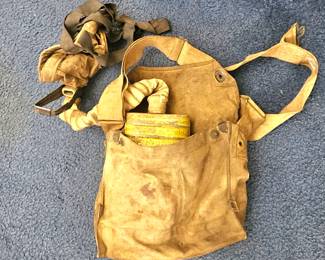 Vintage military gas mask with canister 