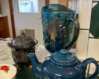 carnival glass pitcher and covered dish, and teal teapot
