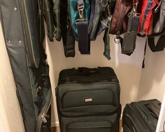 Protocol hanging bag, satchel, and two rolling suitcases