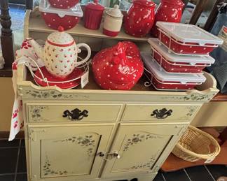 Darling red dishes & cabinet!
