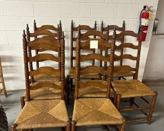 Set of 8 hand-rushed ladder-back dining chairs – excellent condition. Rustic charm meets timeless craftsmanship – perfect for farmhouse, vintage, or Colonial Revival decor. Hand-rushed seats are a labor-intensive craft and a rare find in full sets today.