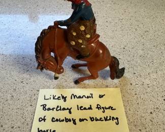 Likely Manoil or Barclay lead figure of cowboy on bucking horse
