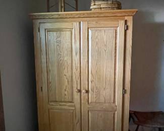 nice storage cabinet for quilts, etc