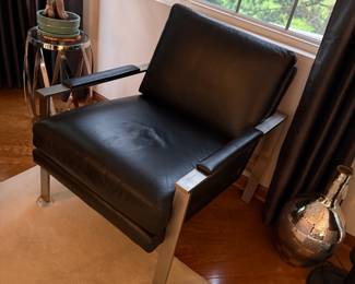 Black leather chair and chrome