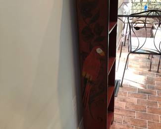 Painted bookcase with parrots