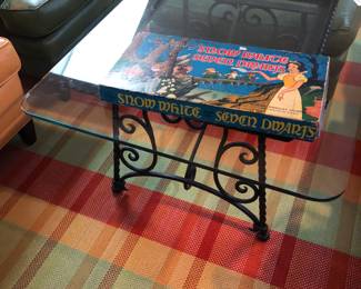 Antique iron and glass curio cocktail table