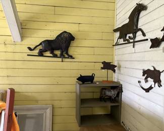 Vintage weathervanes and decorative metal objects