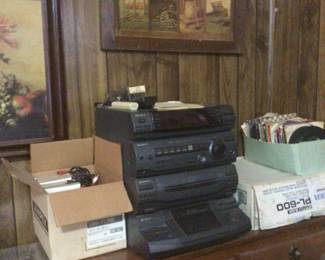 stereo compact hi-fi system includes Sony receiver,lbtg 5500, Sony audiotape & 5 cd changer, 2 speakers $80.; more wall decor, 45’s