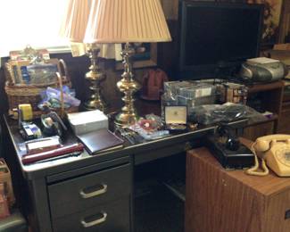 metal desk with chair $65., 2 drawer filing cabinet $22., lots of office supplies, pair of heavy brass lamps, vintage telephones