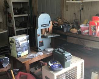 kerosene heater, delta table saw, lots of tools