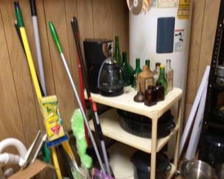 vintage metal rolling cart $45.: misc bottles, brooms, mops