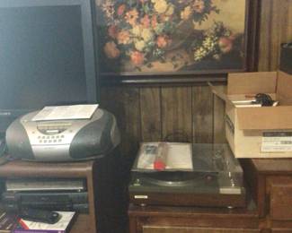 Pioneer turntable $40.; more wall decor, dvd player $30., vhs player $25., Sony Bravia 32” flat screen Tv $45.