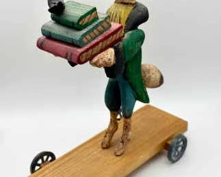 Carved Folk Art Fox on Wheels with Books and Bird