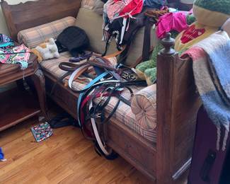 Antique bed with many accessories, belts, handbags, gloves, hat