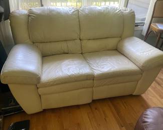 Cream colored reclining sofa