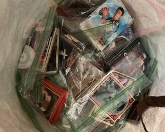 baseball, basketball, football cards, etc