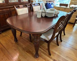 Shermag crotch mahogany extending dining table with two leaves and six dining chairs