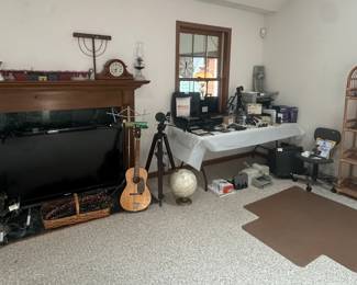 Oil Lamps; Pewter Candle Holders; Westminster Linden Mantle Clock; Metal Wreath Holder; Fireplace Screen; Ornate Chandelier; Sharp Aquos 52in Liquid Crystal TV; Tempo Steel Reinforced Neck Guitar; Music Stand; Radio Shack Sound Level Meter; Realistic Super Cardoid Dynamic Microphone; Basket; Office Chair Mat