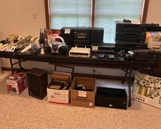 Desk Phones; Answering Machines; Lava Lamp; Boom Box; Stereo Systems; CD Players; Cords and Cables; Frames