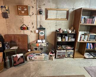Book Case; Books; Tent; Bag Chairs; Folding Table; Bocce Ball; Badmitten; Wash Board; Thermos; Work Boots; Knick Knacks