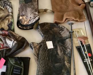 Camouflage hunting masks, gun holsters and snake shinguards