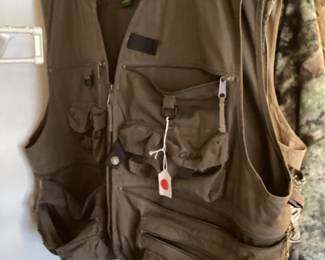 Camouflage and khaki fishing vests